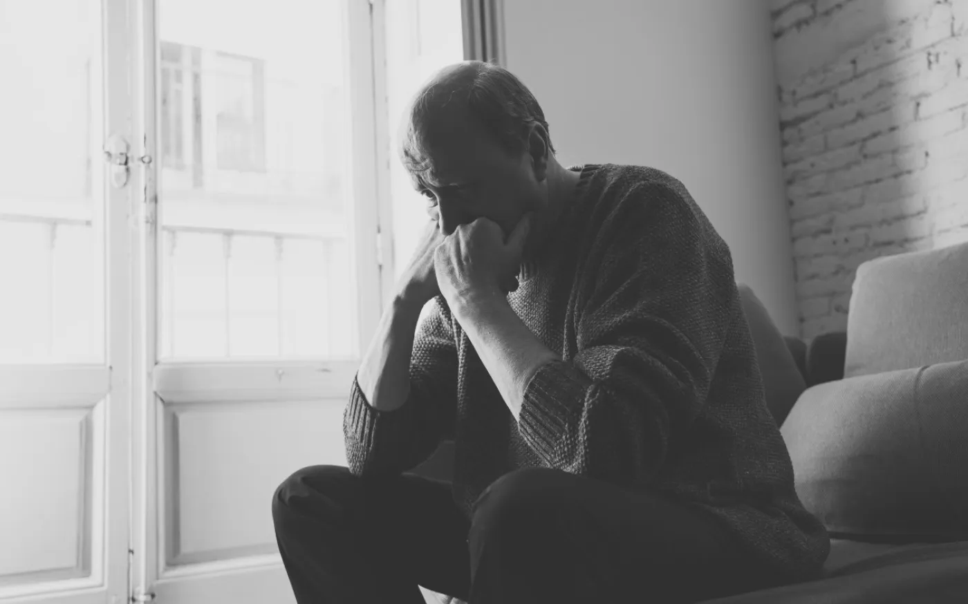 Depressed overwhelmed old man